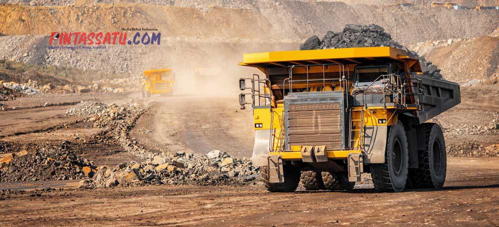 Open pit mine industry, big yellow mining truck for coal anthracite.
